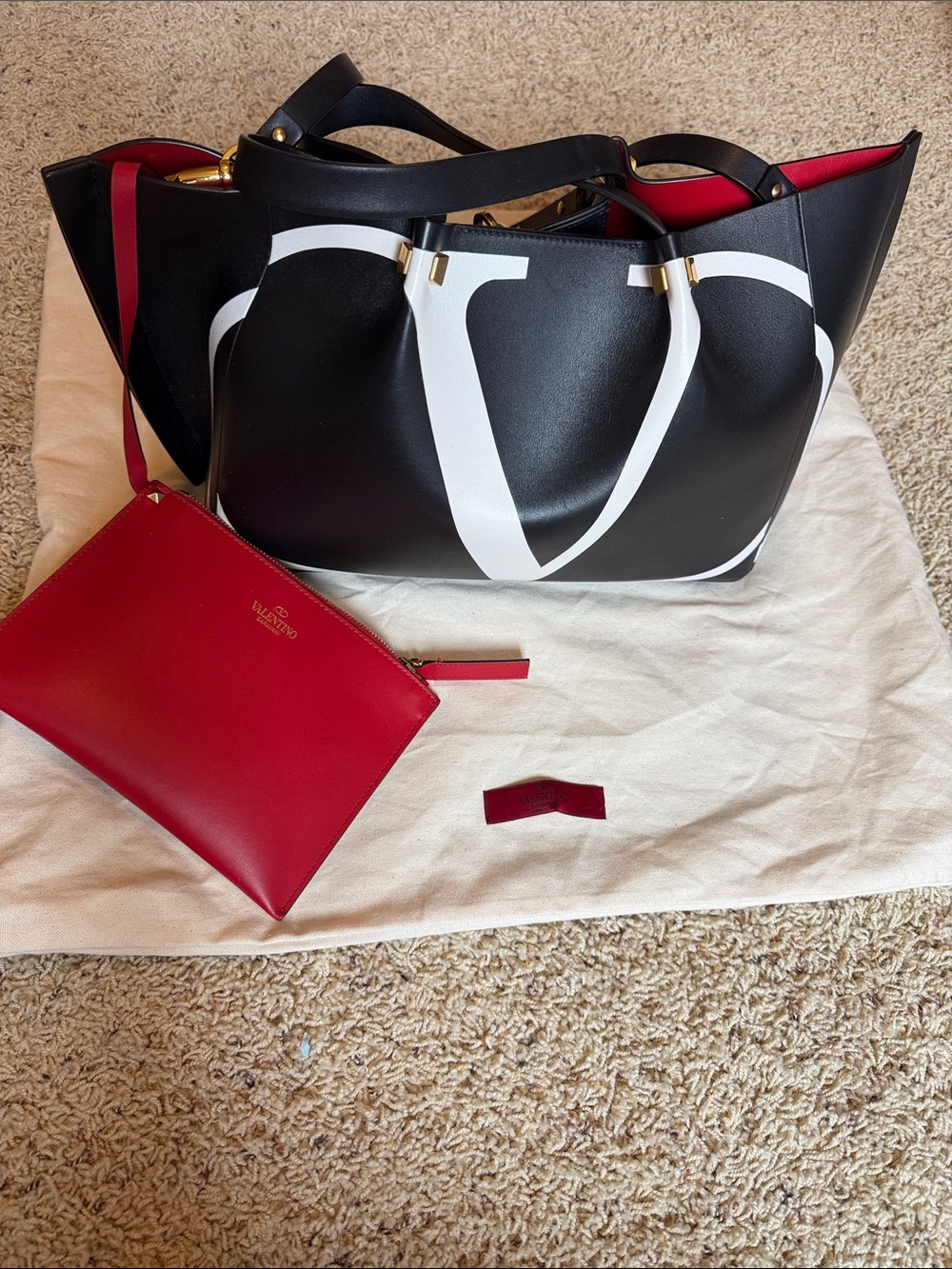Valentino Garavani Black Tote with White V Logo and Red Pouch